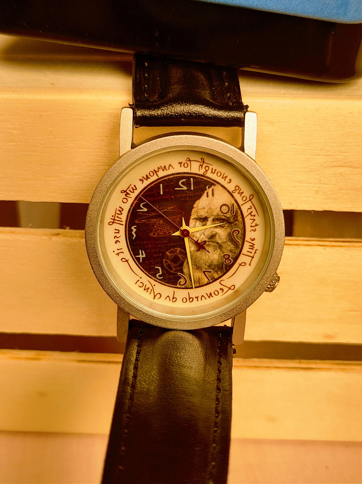 Tempus Fugit 33mm case .,black leather strap.. Leonardo da Vinci is on the dial and everything is backwards, the watch rotates backwards beautiful watch like new condition comes with case