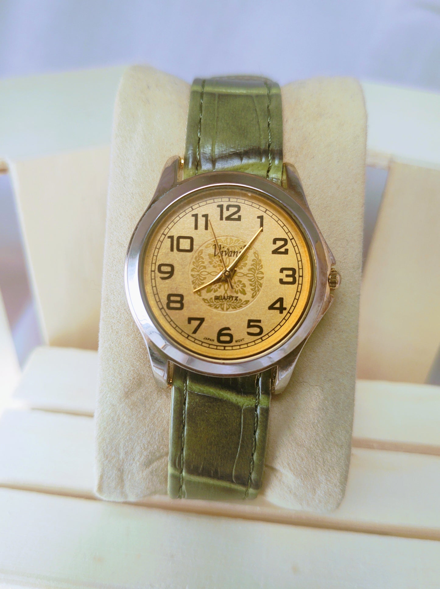 Vivani stainless case manilla dial .. green leather strap quartz watch